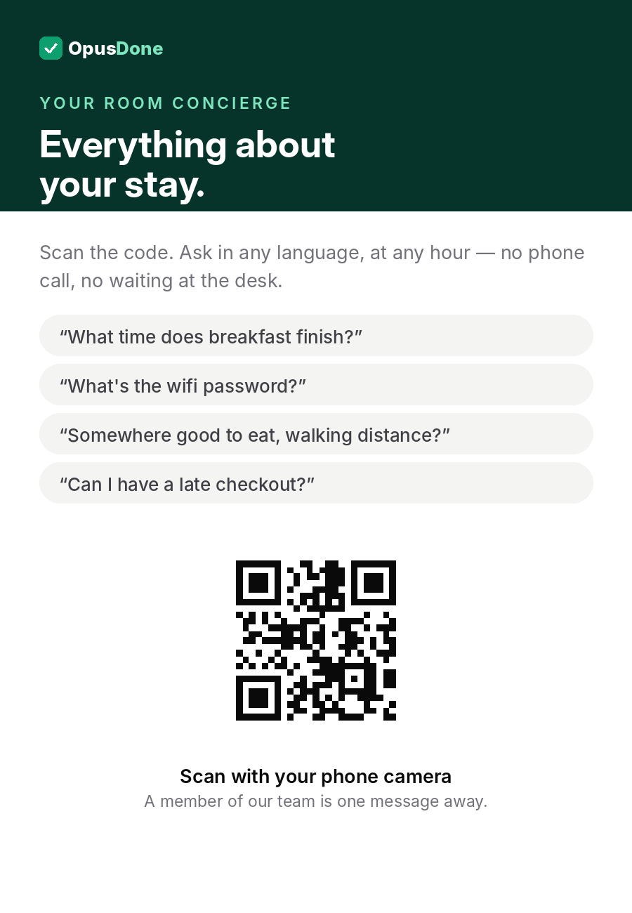A printed hotel room card reading "Everything about your stay", with four example questions and a code to scan