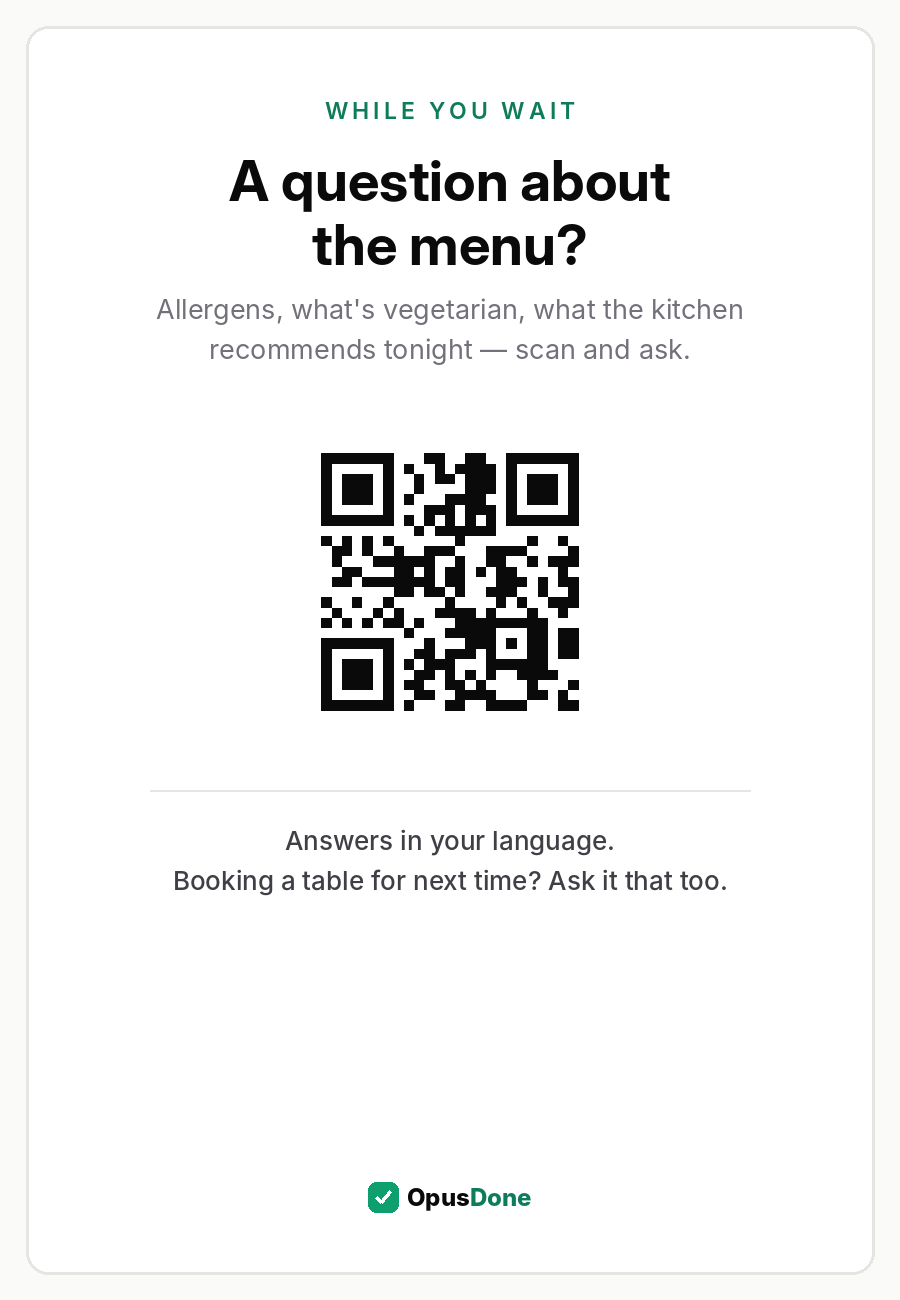 A restaurant table card reading "A question about the menu?", with a code to scan